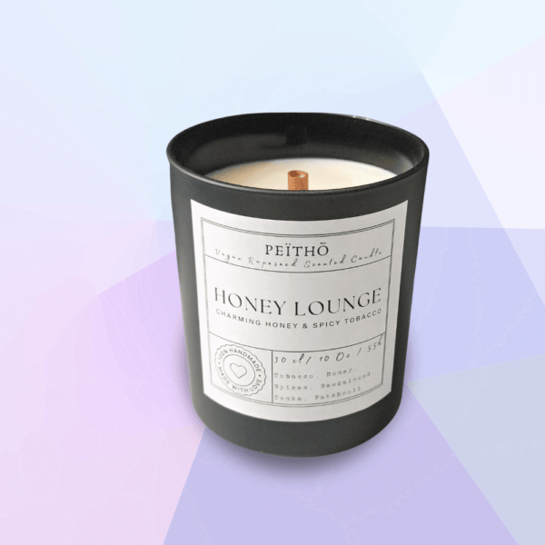 Peitho-Perfumes.ScentedCandles_ A homemade scented candle with the words 'honey lounge' on it.