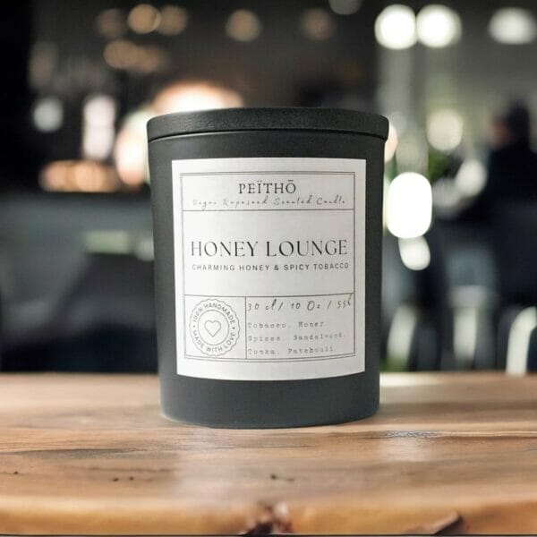 Peitho-Perfumes.ScentedCandles_ A scented candle featuring a honey lounge aroma.