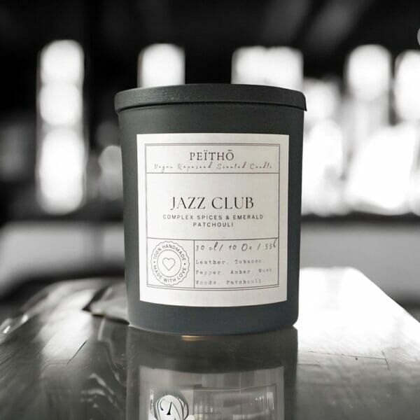 Peitho-Perfumes.ScentedCandles_ A homemade Swiss scented candle inspired by molecular perfume, gracing a jazz club table.