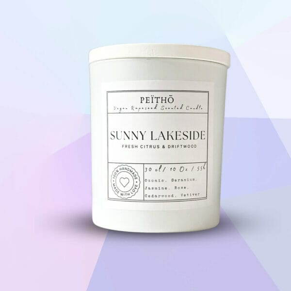 Peitho-Perfumes.ScentedCandles_ A jar with the words Sunny Lakeside - Scented Candle infused with a delightful perfume scent.