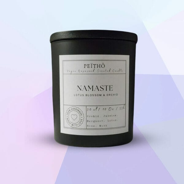 Peitho-Perfumes.ScentedCandles_ black candle jar called namaste on purple background