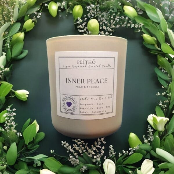 Peitho-Perfumes.ScentedCandles_ A Inner Peace - Scented Candle with the words inner peace on it.