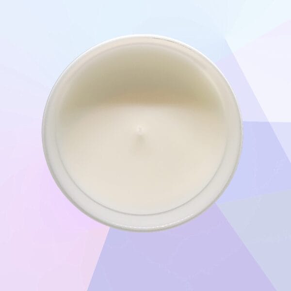 Peitho-Perfumes.ScentedCandles_ A White Xmas - Scented Candle on a purple and blue background.