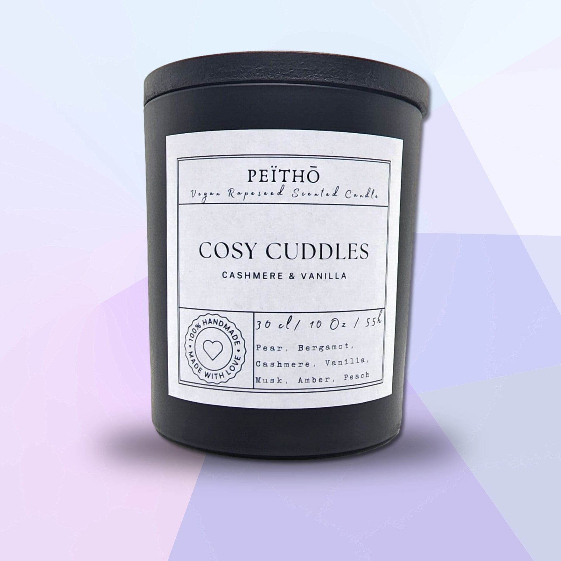 Peitho-Perfumes.ScentedCandles_ A candle with the words'cosy cuddles'on it.