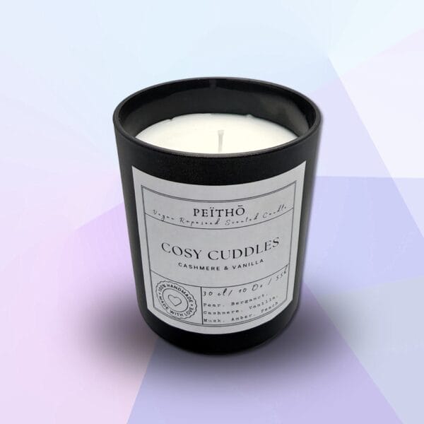 Peitho-Perfumes.ScentedCandles_ A candle with the words cosy cubes on it.